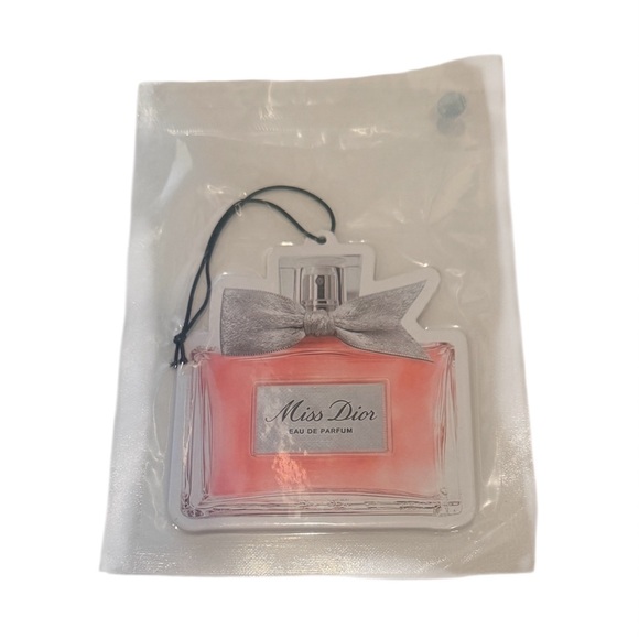 Dior Cream Pouch with Pink Embroidered Accents with Dior lipstick and Eye Liner - Picture 2 of 13